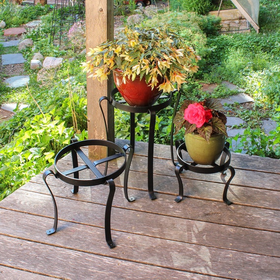 Enhance Your Garden Aesthetic with Unique Outdoor Wrought Iron Plant Stands Enhance Your Garden Aesthetic with Unique Outdoor Wrought Iron Plant Stands